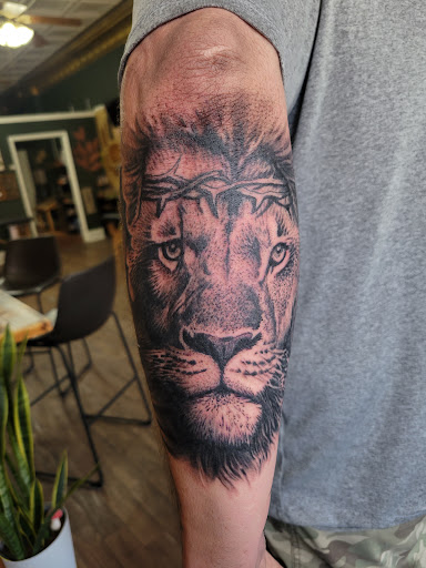 Explore mens back tattoos ideas, creative tattoo ideas in Kirksville, available at Nightshade Tattoo and Body Piercing