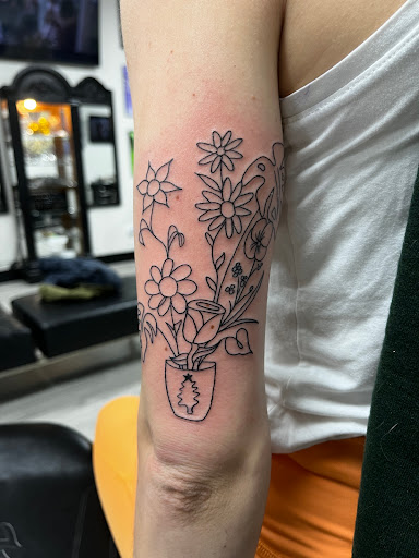 Explore chest tattoo lettering ideas, creative tattoo ideas in Lombard, available at New Hope Tattoo