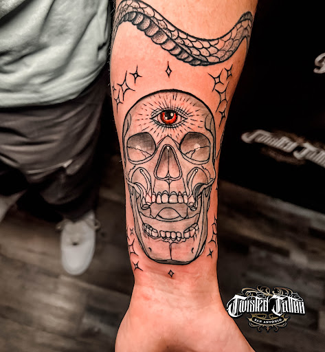 Explore small dragon tattoo ideas, creative tattoo ideas in San Antonio, available at Twisted Tattoo