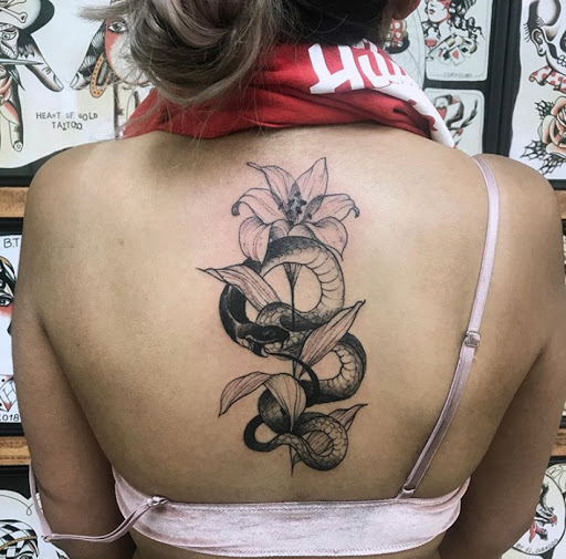 Explore cool neck tattoo ideas, creative tattoo ideas in Campbellsville, available at Green River Tattoo Company