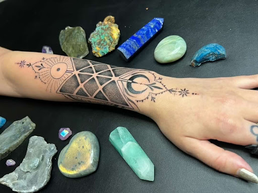 Explore dog paw print tattoo ideas, creative tattoo ideas in Asheville, available at Spirit Alchemy Tattoo