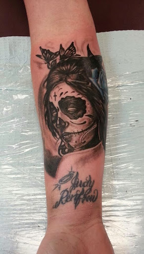 Explore statue tattoo ideas, creative tattoo ideas in Sarasota, available at Z-Edge Tattoo and Body Piercing North Shop