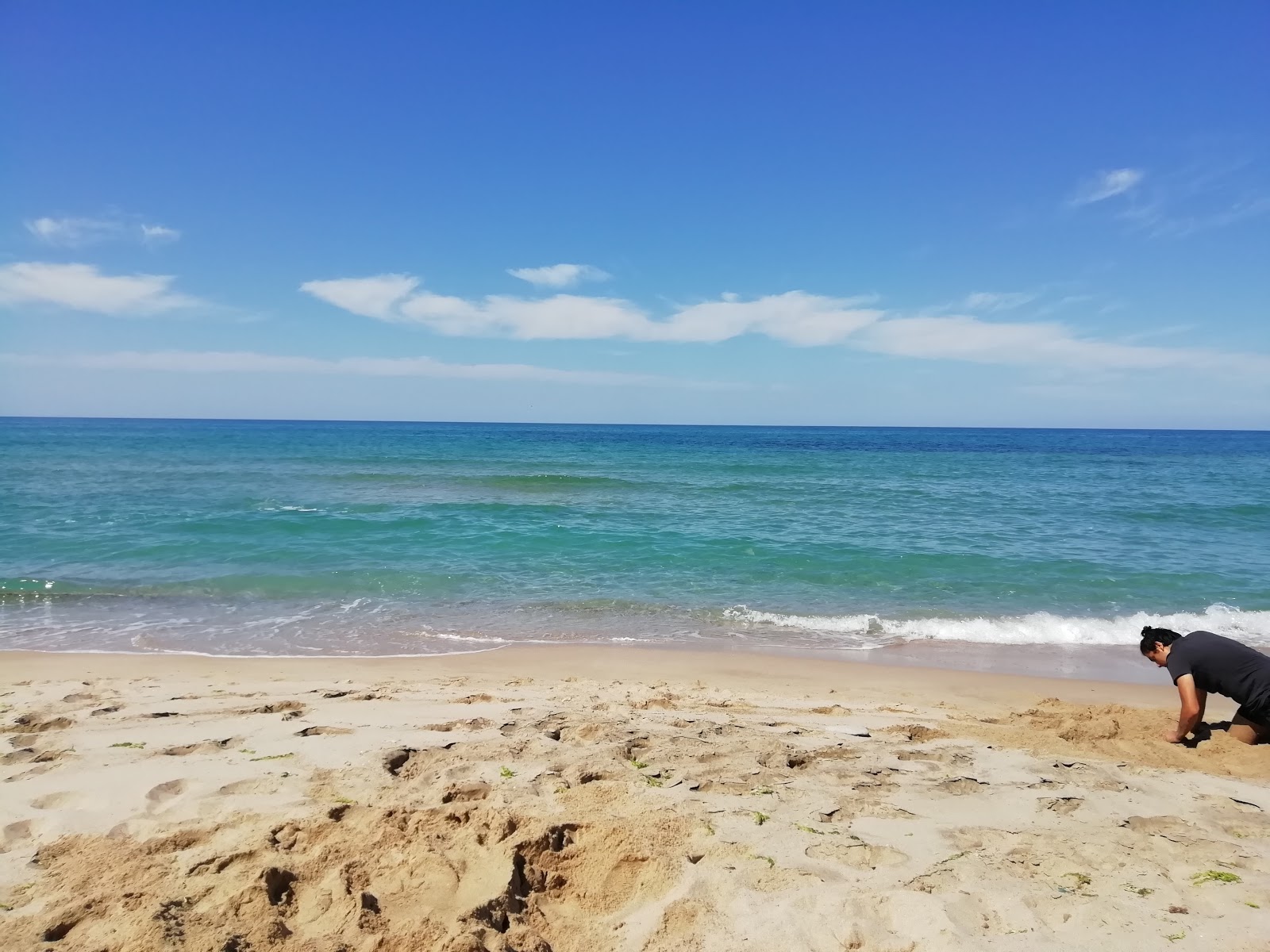 Fotografija Karaburun beach II in naselje