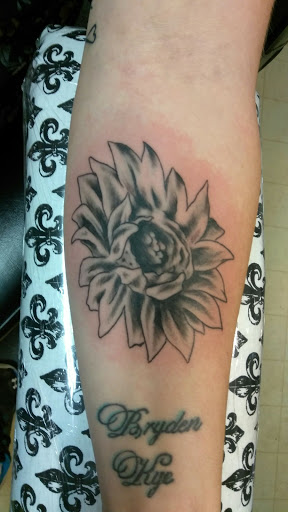 Explore cool name tattoo ideas, creative tattoo ideas in Bowling Green, available at Taboo Tattoos and Piercings