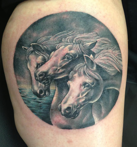 Explore cover up tattoo ideas female back, creative tattoo ideas in Erie, available at Wayward Tattoo Studio