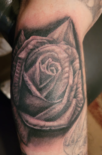 Explore coverup tattoo ideas, creative tattoo ideas in Las Vegas, available at Work of Art Tattoo and Piercing