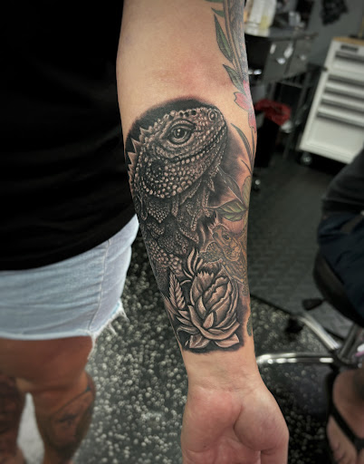Explore half sleeve men tattoo ideas, creative tattoo ideas in Fort Myers, available at Loyal 2 The Coil Tattoos & Piercings (Edison Mall Location Entrance F)