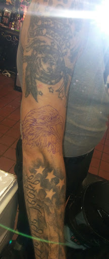 Explore guy back tattoo ideas, creative tattoo ideas in Vinton, available at Cherry Bomb Tattoo and piercing