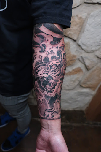 Find best back tattoo ideas for your next unique tattoo in Austin at Black Swan Tattoo Company