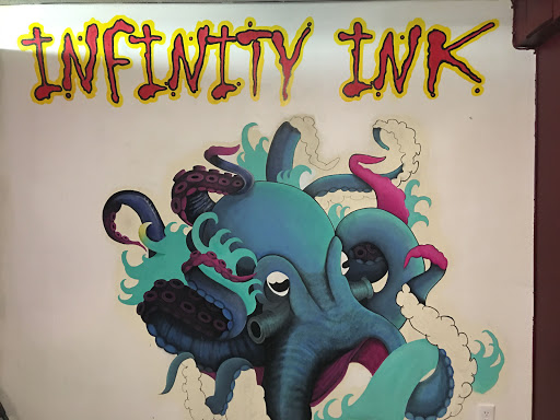 Explore small love tattoo ideas, creative tattoo ideas in Anniston, available at Infinity Ink