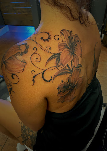 Find aquatic tattoo ideas for your next unique tattoo in Osage Beach at Rabbits Foot Tattoo Parlor