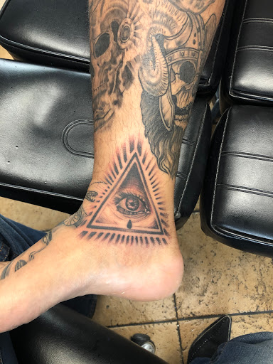 Explore full neck tattoo ideas for men, creative tattoo ideas in Sacramento, available at Aztec Heart Tattoo