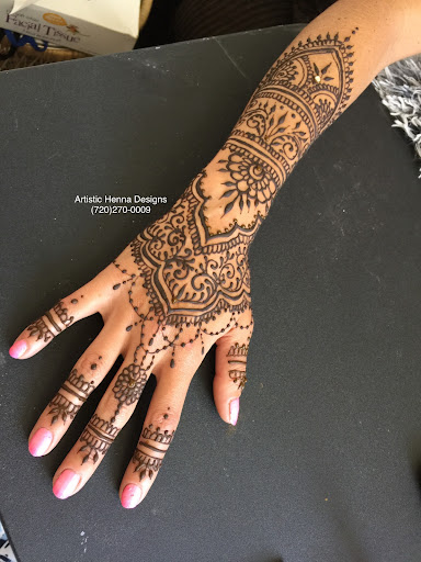 Explore tattoo ideas for behind the ear, creative tattoo ideas in Littleton, available at Artistic Henna Designs