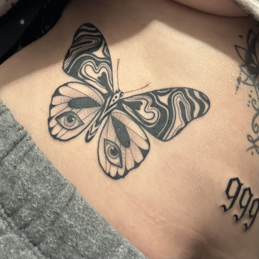 Explore airplane tattoo ideas, creative tattoo ideas in Mount Vernon, available at Gothic Heart Tattoo