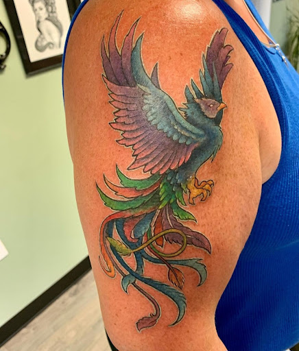 Explore queen of hearts tattoo ideas, creative tattoo ideas in Millsboro, available at Tattoo Galaxy (Millsboro) Piercing & Custom tattoos