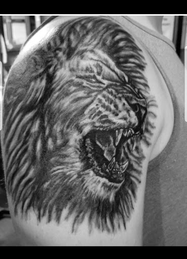 Find joker tattoos ideas for your next unique tattoo in Erie at EliKingInk