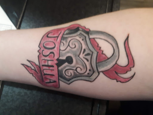 Tattoo Shop «Liquid Tattoo», reviews and photos, 16583 Old U.S. 27, Lansing, MI 48906, USA