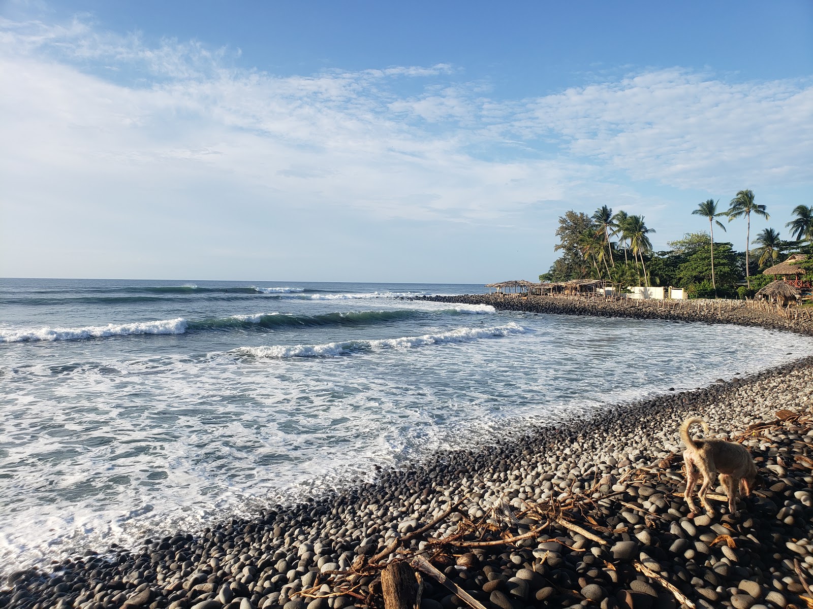 Foto av K59 resort beach med grå sten yta