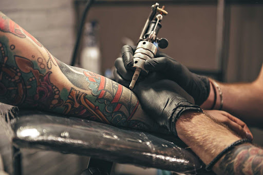Explore left arm sleeve tattoo ideas, creative tattoo ideas in Traverse City, available at Pinups & Needles