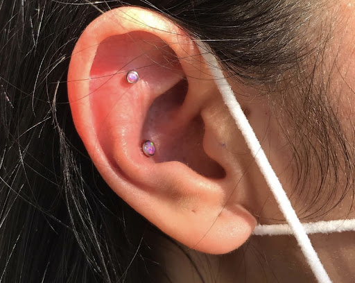 Explore tattoo ideas for legs, creative tattoo ideas in San Diego, available at Luna Studio Body Piercings & Tooth gems