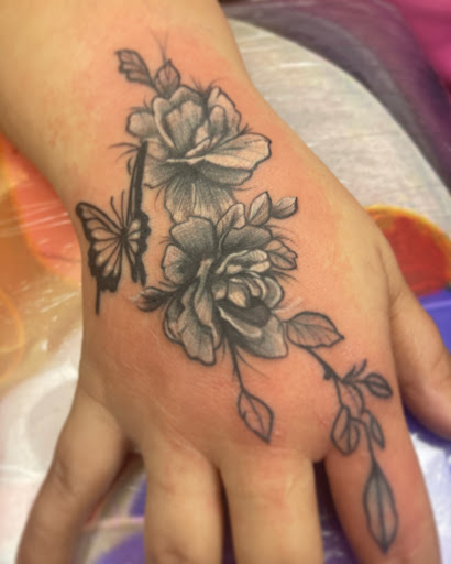 Explore hamsa tattoo ideas, creative tattoo ideas in Tehachapi, available at Briar Rose TATTOO