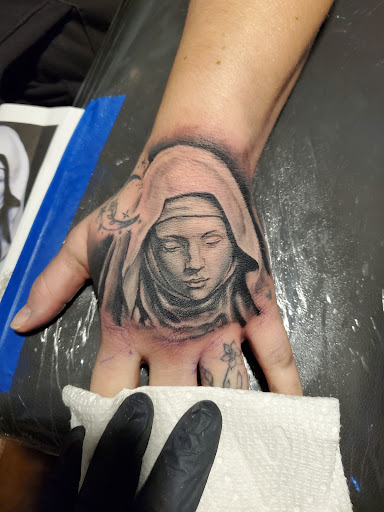 Explore praying mantis tattoo ideas, creative tattoo ideas in Fresno, available at Happy Client Tattoo