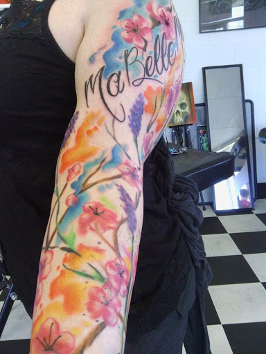 Tattoo Shop «Muskegon Electric Coil Tattoo & Body Piercing, LLC», reviews and photos, 976 1st St, Muskegon, MI 49440, USA