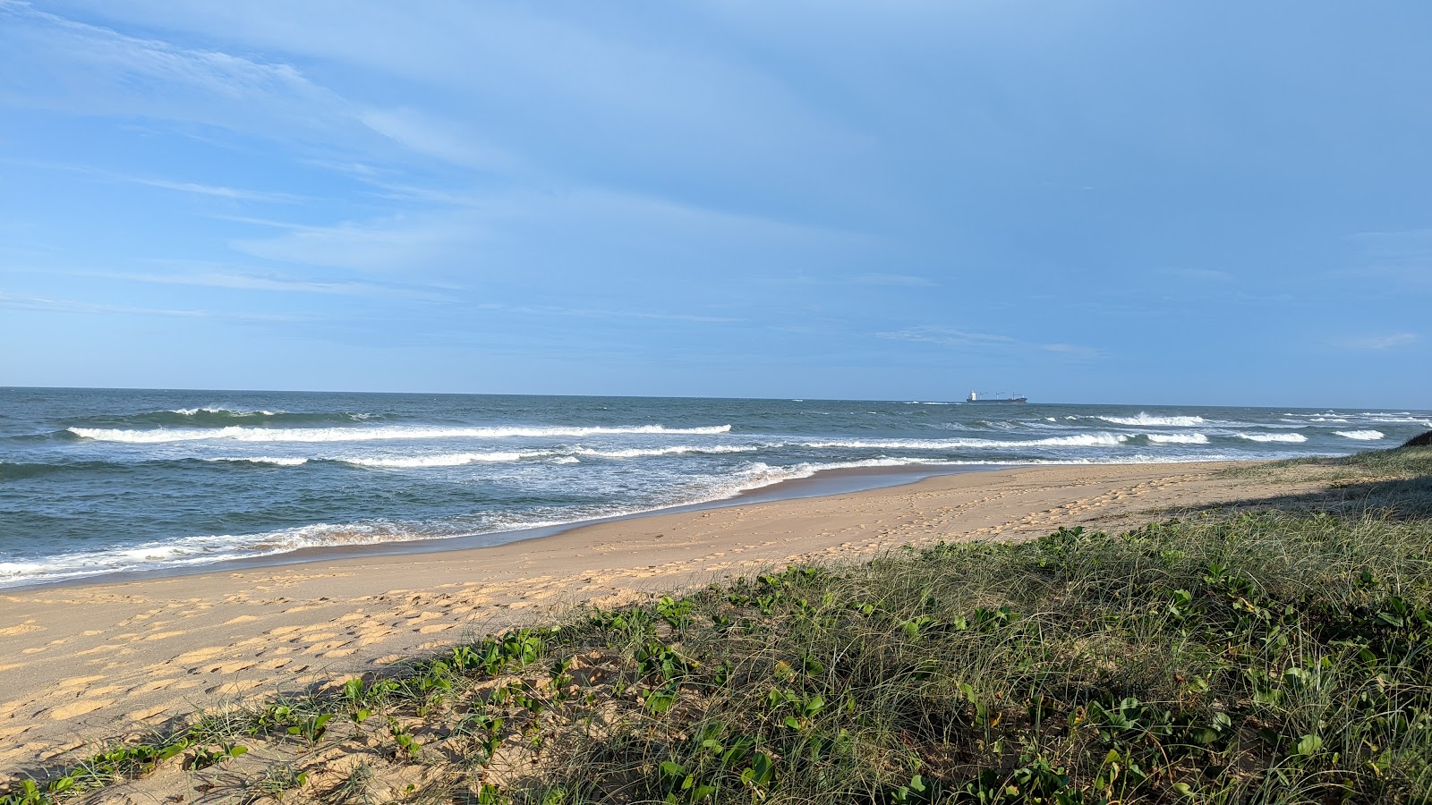 Foto de Shelly Beach e o assentamento