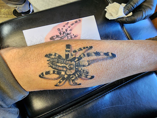 Explore wolf tattoo ideas for guys, creative tattoo ideas in Charlottesville, available at ScottyrocksTwisted Inks