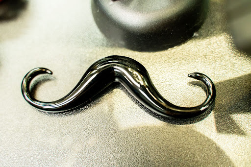 Explore pokeball tattoo ideas, creative tattoo ideas in North Charleston, available at Exotic Impressions Body Piercing