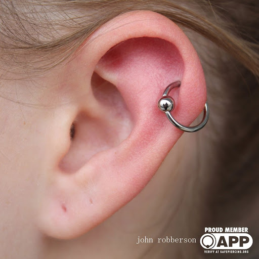 Explore tragus tattoo ideas, creative tattoo ideas in Fort Myers, available at Tiger Lotus Tattoo and Piercing