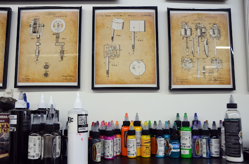 Explore cover up tattoo ideas female back, creative tattoo ideas in Ballwin, available at Neon Moon Studio