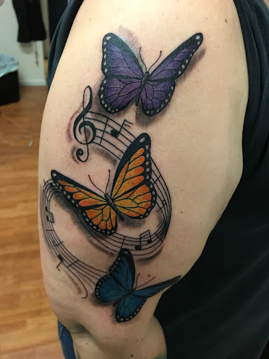 Explore old english tattoo ideas, creative tattoo ideas in Altoona, available at Living Canvas Studio LLC