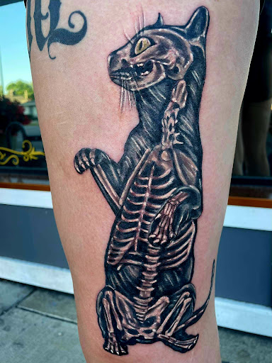 Explore bear tattoo ideas for men, creative tattoo ideas in Shelbyville, available at Stage Left Tattoo and Piercing