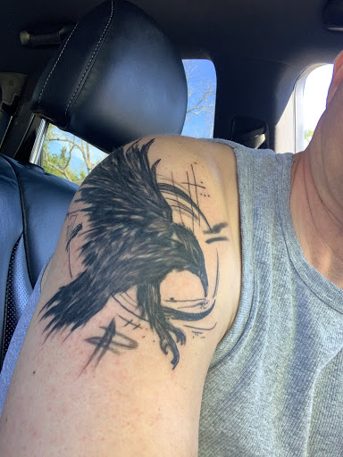 Explore foo fighters tattoo ideas, creative tattoo ideas in San Antonio, available at Ink & Iron Tattoos & Piercings