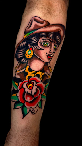 Explore dog bone tattoo ideas, creative tattoo ideas in Johnson City, available at Gold Cross Tattoo Co.