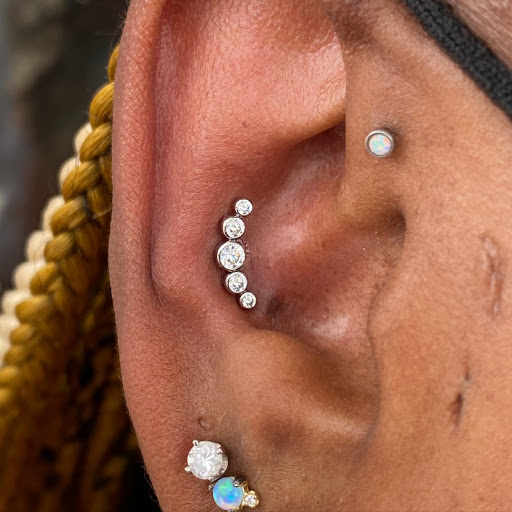 Explore angel forearm tattoo ideas, creative tattoo ideas in Dover, available at Agap Body Piercings