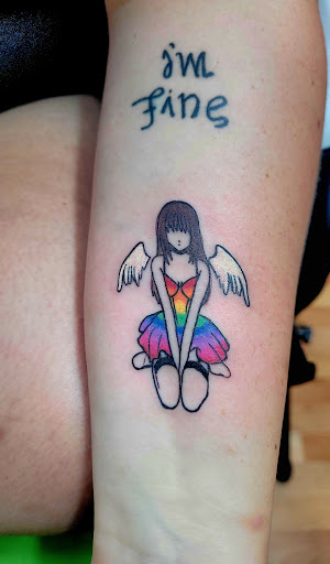 Explore tattoo ideas hands, creative tattoo ideas in Benton, available at Spectrum Tattoo