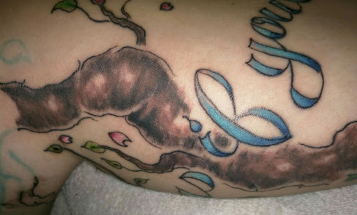 Explore flower tattoo ideas for men, creative tattoo ideas in Allentown, available at Critical Acclaim Tattoos