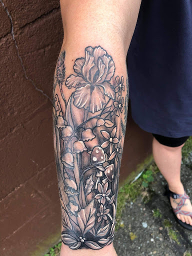 Explore simple spine tattoo ideas, creative tattoo ideas in Minocqua, available at Family Tradition Tattoo Co.