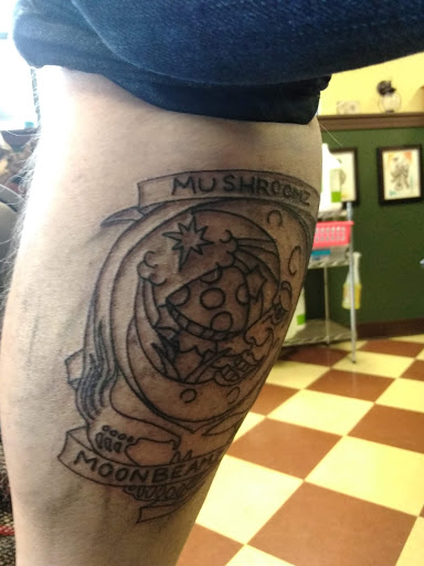 Explore women's ankle tattoo ideas, creative tattoo ideas in Erie, available at Wayward Tattoo Studio