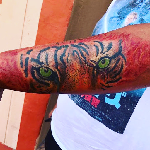 Explore lilac tattoo ideas, creative tattoo ideas in Miami, available at Waldo Tattoos and Piercings Miami