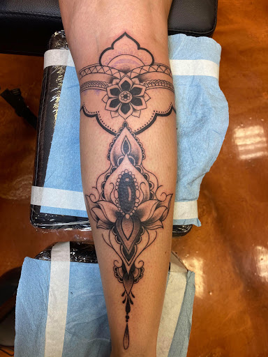 Explore cover up ideas for name tattoos, creative tattoo ideas in Aledo, available at Elevated Tattoo & Piercing