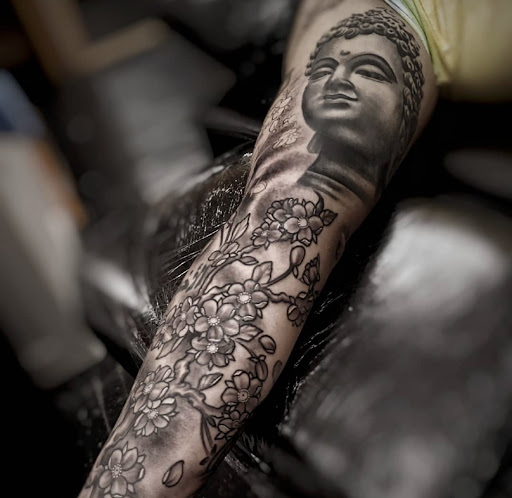 Explore mens elbow tattoo ideas, creative tattoo ideas in Sioux City, available at Living Art Tattoo Studio