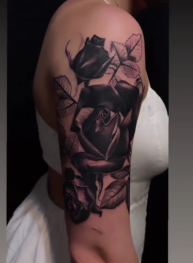 Explore floral hand tattoo ideas, creative tattoo ideas in Walnut Creek, available at Zebra Tattoo & Body Piercing