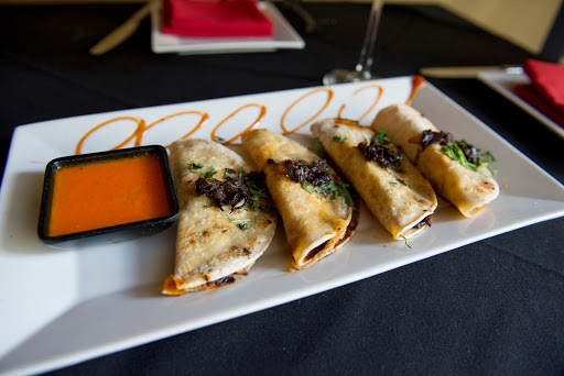 Latin American Restaurant «De La Vega Restaurante y Galeria», reviews and photos, 128 N Woodland Blvd, DeLand, FL 32720, USA