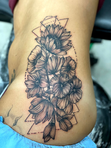 Explore waistline tattoo ideas, creative tattoo ideas in Lawton, available at Impact Ink Tattoo Studios