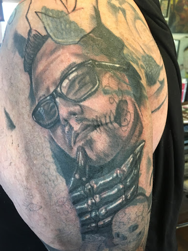 Find jesus tattoo ideas for your next unique tattoo in Milford at Golden Hammer Tattoo Studios