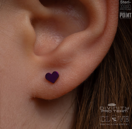 Explore chest tattoo lettering ideas, creative tattoo ideas in Roanoke, available at Clove Piercing & Fine Jewelry