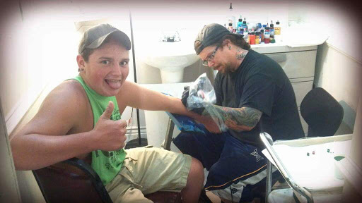 Explore machine tattoo ideas, creative tattoo ideas in Bridgeport, available at Pike Street Studios Tattoo and Body Piercing